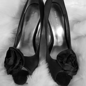Black satin pumps